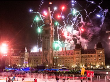 The annual holiday lighting ceremony on Parliament Hill included fireworks in addition to the skating rink celebrating Canada 150. Photo Wayne Cuddington/ Postmedia