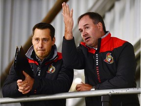 Ottawa Senators head coach Guy Boucher, left, and general manager Pierre Dorion.