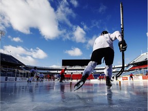 Canada players take the ice during their outdoor hockey practice at New Era Field during the IIHF World Junior Championship in Orchard Park, N.Y.