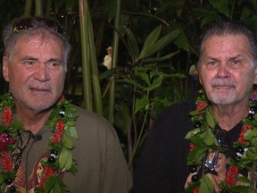 In this Dec. 23, 2017, image made from a video provided by Honolulu news station KHON, Alan Robinson and Walter Macfarlane are interviewed in Honolulu. The two Hawaii men grew up as best friends and recently learned that they're actually brothers. They revealed the surprise to family and friends over the holidays. The two, who have been friends for 60 years, were born in Hawaii 15 months apart and met in the sixth grade.