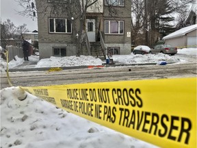 A crime scene is cordoned off with police tape as officials investigate a homicide that occurred early Saturday morning on Fréchette Street in Vanier.
