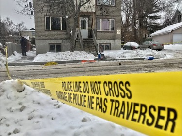 A crime scene is cordoned off with police tape. Authorities are investigating a homicide that occurred early Saturday morning on Freshette Street in Vanier. Ashley Fraser/Postmedia