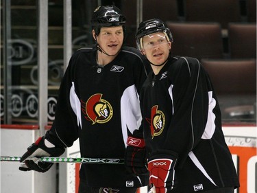 Ottawa-03/08/07-L2R Ottawa Senators' Chris Neil and Daniel Alfredsson chat, during their game day practice, on March 08, 2007, at Scotiabank Place. The Senators take on the Leafs this evening, in the first game of a home and home. The Senators are currently winless in 3 games.