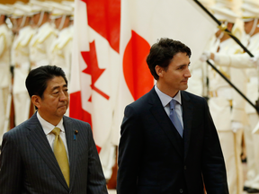 Prime Minister Justin Trudeau with Japan's Prime Minister Shinzo Abe in Tokyo, May 24, 2016.