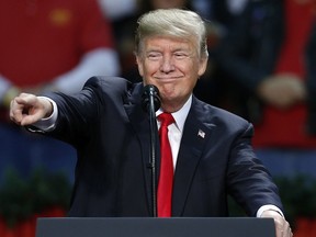 President Donald Trump speaks during a rally in Pensacola, Fla., Friday, Dec. 8, 2017.