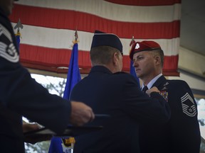 Lt. Gen. Brad Webb, commander of Air Force Special Operations Command, pins a Silver Star Medal on Chief Master Sgt. Michael West, a Special Tactics operator with the 24th Special Operations Wing, during his ceremony, Dec. 15, 2017, at Hurlburt Field.
