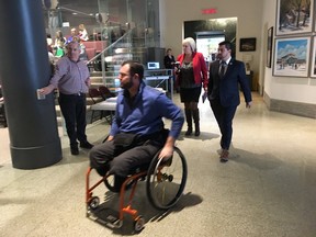 Jody Mitic arrives for council's meeting Wednesday.