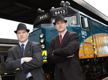 Chris Neil (L) and Matt Carkner of the Ottawa Senators pose in front of the train prior to boarding the train to Montreal.  The Ottawa Senators will take part in the Operation Montreal - Heritage Train trip to Montreal. A group of 280 people, including the entire Senators team, management, partners and fans, will board a Via Rail train and travel to Montreal in advance of Ottawa's game against the Montreal Canadiens on March 14 at the Bell Centre. In honour of the trip, the team will wear its heritage uniform during the March 14 game.