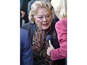 FILE- In this April 1, 2002, file photo, actress and comedian Rose Marie talks to the press as she arrives for a ceremony honoring comedian Milton Berle at Hillside Memorial Park and Mortuary in Los Angeles. Family spokesman Harlan Boll said Marie, the wisecracking Sally Rogers of "The Dick Van Dyke Show," died Thursday, Dec. 28, 2017. She was 94.