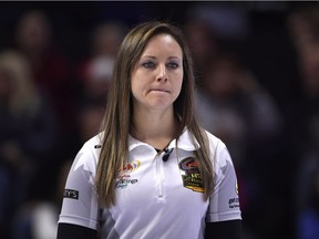 Skip Rachel Homan looks perplexed as she peers down the sheet during the 10th end of Saturday's opening game of the Olympic curling trials in Ottawa.