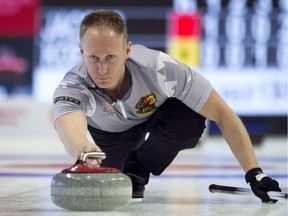 Skip Brad Jacobs, of Sault Ste. Marie, males a shot during the Canadian Olympic curling trials against team Koe, in Ottawa on Sunday, December 3, 2017.