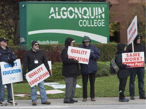 College faculty walk the picket line outside Algonquin College during the five-week strike. October 16, 2017.