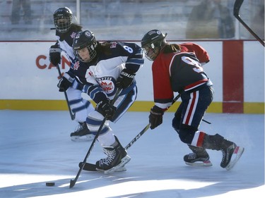 The 19th annual Bell Capital Cup officially got underway at the Canada 150 hockey rink on Parliament Hill in Ottawa Wednesday Dec 27, 2017. The Brampton Canadettes (white and blue) and the Kanata Rangers girls Pee-Wee AA made it through the first period of the 10:10 a.m. game Wednesday before it was called off due to poor ice conditions as a result from the weather being too cold.    Tony Caldwell