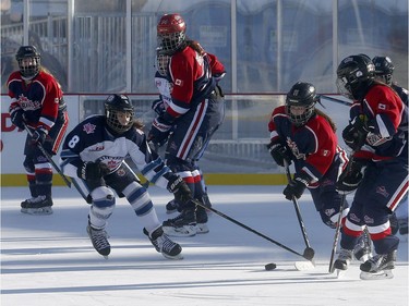 The 19th annual Bell Capital Cup officially got underway at the Canada 150 hockey rink on Parliament Hill in Ottawa Wednesday Dec 27, 2017. The Brampton Canadettes (white and blue) and the Kanata Rangers girls Pee-Wee AA made it through the first period of the 10:10 a.m. game Wednesday before it was called off due to poor ice conditions as a result from the weather being too cold.    Tony Caldwell