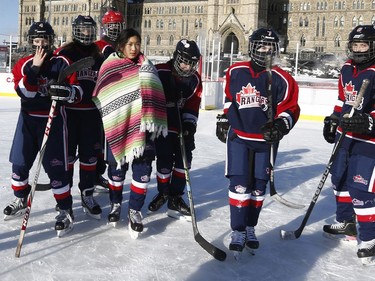 The 19th annual Bell Capital Cup officially got underway at the Canada 150 hockey rink on Parliament Hill in Ottawa Wednesday Dec 27, 2017. The Brampton Canadettes (white and blue) and the Kanata Rangers girls Pee-Wee AA made it through the first period of the 10:10 a.m. game Wednesday before it was called off due to poor ice conditions as a result from the weather being too cold. The Kanata Rangers girls try and keep warm after Wednesday's game.   Tony Caldwell