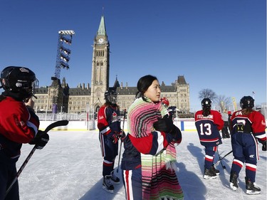 The 19th annual Bell Capital Cup officially got underway at the Canada 150 hockey rink on Parliament Hill in Ottawa Wednesday Dec 27, 2017. The Brampton Canadettes (white and blue) and the Kanata Rangers girls Pee-Wee AA made it through the first period of the 10:10 a.m. game Wednesday before it was called off due to poor ice conditions as a result from the weather being too cold. The Kanata Rangers girls try and keep warm after Wednesday's game.   Tony Caldwell