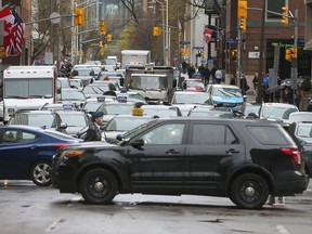 Ontario car-insurance prices will drop starting next year, Finance Minister Charles Sousa said Tuesday.