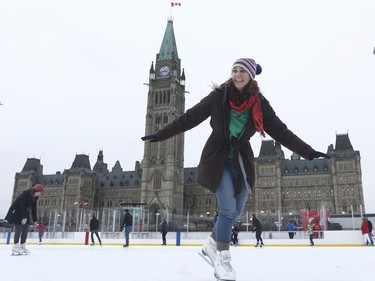 Postmedia reporters Nicole Feriancek goes for a skate on the new rink on Parliament Hill in Ottawa Thursday Dec 7, 2017.    Tony Caldwell