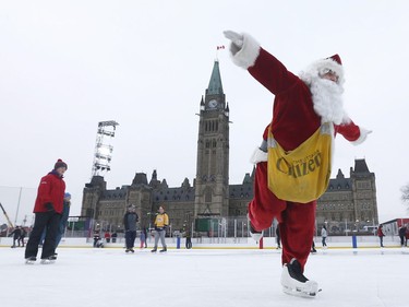 Post media reporter Bruce Deachman goes for a skate on Parliament Hill in Ottawa Thursday Dec 7, 2017. Bruce was dressed up like Santa while skating Thursday.    Tony Caldwell