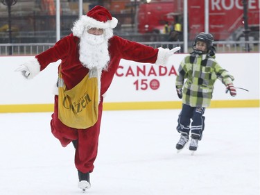 Post media reporter Bruce Deachman goes for a skate on Parliament Hill in Ottawa Thursday Dec 7, 2017. Bruce was dressed up like Santa while skating Thursday.    Tony Caldwell