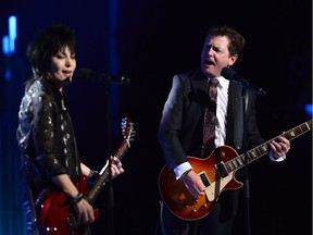Michael J. Fox, right, performs onstage with Joan Jett during the Governor General's Performing Arts Awards gala at Rideau Hall in Ottawa on Thursday, June 29, 2017.