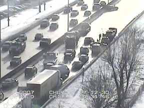 First responders work to clear a multi-vehicle collision on Highway 417 near Churchill Avenue Saturday. There were no serious injuries.