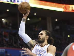 Oklahoma City's Steven Adams shoots a floater against the Raptors during Wednesday's game.