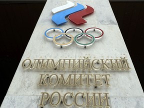 The logo of the Russian Olympic Committee is mounted at the entrance of the head office in Moscow in this December file photo.