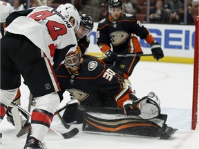 Anaheim Ducks goalie Ryan Miller (30) stops a shot by Ottawa Senators center Jean-Gabriel Pageau (44) during the first period of an NHL hockey game in Anaheim, Calif., Wednesday, Dec. 6, 2017.