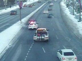 The car on the left did a 180-degree spin on the icy Portage Bridge Thursday morning, slowing down traffic for more than hour.