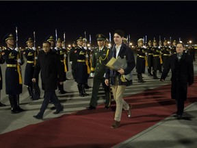 Prime Minister Justin Trudeau arrives in Beijing, China last Sunday. Some readers were upset with his casual demeanour; others think our columnist has been too harsh on the prime minister's China policy.