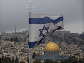 A view of Jerusalem Old City seen from Mount of Olives, Wednesday, Dec. 6, 2017. U.S. officials say President Donald Trump will recognize Jerusalem as Israel's capital Wednesday, Dec. 6, and instruct the State Department to begin the multi-year process of moving the American embassy from Tel Aviv to the holy city. His decision could have deep repercussions across the region.