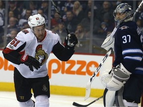 Senators forward Mark Stone, left, seen here during Sunday's game at Winnipeg, is expected to play Wednesday night against the Ducks despite missing practice Tuesday because of illness. Kevin King/Postmedia