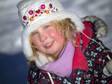 Four-year-old Ella Cooper had rosy cheeks while tobogganing at the Westboro Beach hill.