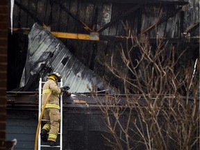 Firefighters were on the scene of a fire that spread from a house under construction to a neighbouring duplex Saturday morning.