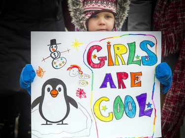 Five-year-old Penelope Dej had a fantastic sign at the Women's March on Ottawa.