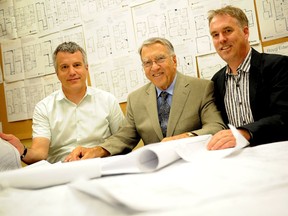Ian Nicol, left, his father Wes and brother Bruce are the men behind local housing developers Tartan Homes.