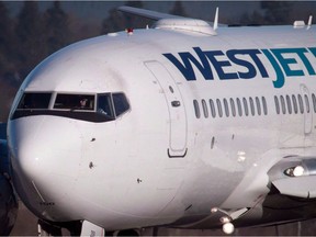 A file photo of a WestJet plane in 2014.