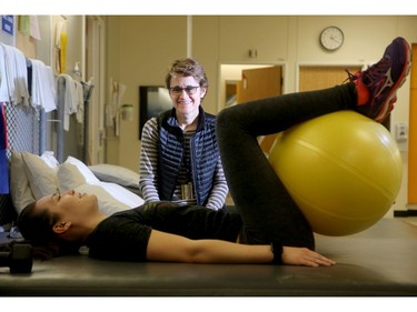 Stephanie Albert works out with physiotherapist Marie-Andrée Paquin.