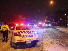 Fire, Police, snow and traffic on Albert St in Ottawa, January 12, 2018.