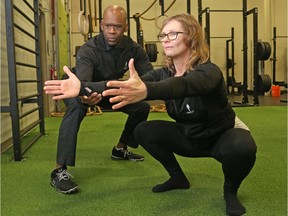 Dr. Chris Raynor and Mandy show off a sequence of exercise to stay fit on a daily basis at their Human 2.0 facility in Ottawa.