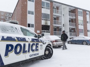 Gatineau Police guard the scene of an overnight fire at 16 rue Tasse. January 2,2018.
