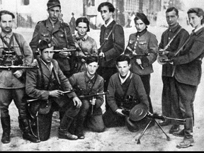 Abba Kovner, standing in the center, with members of the Jewish Resistance in Vilnius.