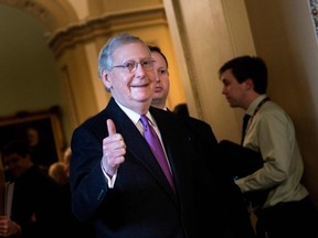 Senate Majority Leader Senator Mitch McConnell (R-KY) walks from a vote on Capitol Hill after the senate voted to fund the US government January 22, 2018 in Washington, DC.