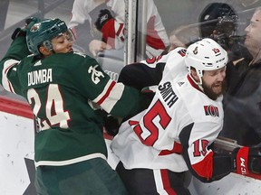 Senators forward Zack Smith, right, tries to break free from the Wild's Matt Dumba in the first period of a game on Jan. 22.