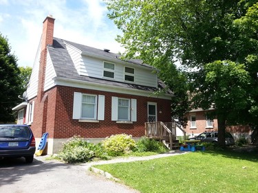 BEFORE: The front of the home prior to renovation.