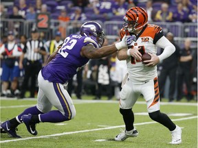 Vikings defensive lineman Tom Johnson pressures Bengals quarterback Andy Dalton during a Dec. 17 game in Minneapolis.