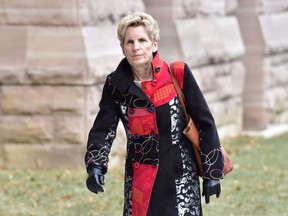 Ontario Premier Kathleen Wynne arrives at Legislative Assembly of Ontario in Toronto on Thursday Jan. 25, 2018. Ontario's Opposition leader Patrick Brown has stepped down overnight, hours after holding a news conference to deny what he called "troubling allegations'' that he didn't detail.