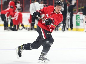 Thomas Chabot of the Ottawa Senators shoots during the morning skate at Canadian Tire Centre in Ottawa, September 18, 2017. (Jean Levac/Postmedia)