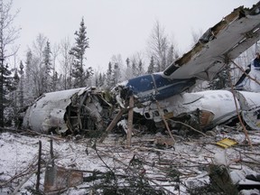 The wreckage of an aircraft is seen near Fond du Lac, Sask. on Thursday, December 14, 2017 in a handout photo.